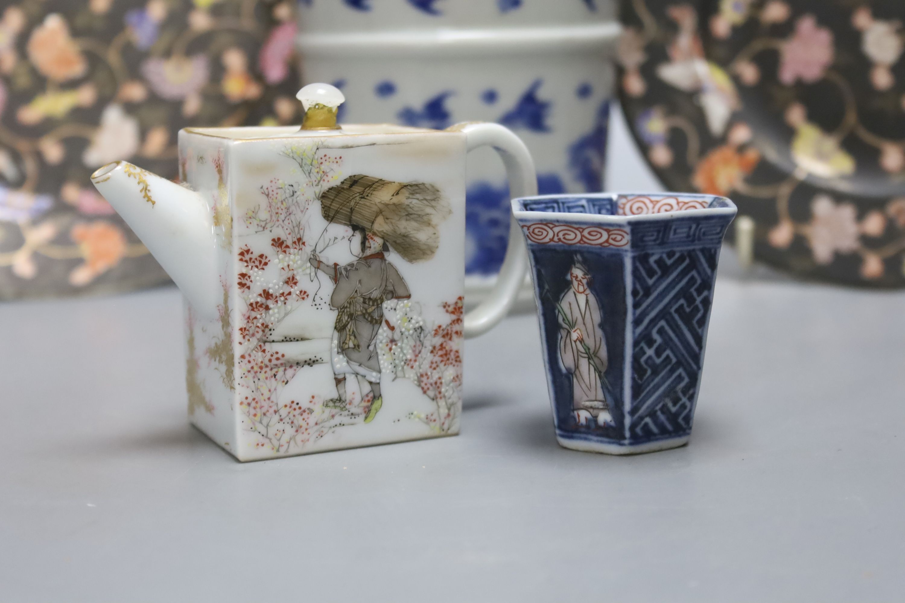 Two Fukagawa Koransha plates, a Kanzan Denshichi rectangular water dropper, a Japanese blue and white bucket and a dish, tallest 20cm